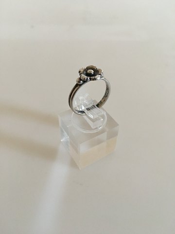 N.E. From ring made of Sterling Silver.