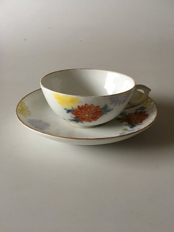 Royal Copenhagen No 93 White Half Laced w. Flowers and Gold Teacup and Saucer