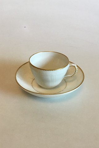 Royal Copenhagen White Curved with serrated Gold edge(Pattern 387/ Josephine) 
Coffee Cup and Saucer No 1549