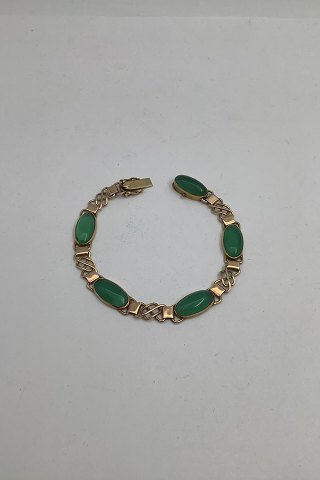 14 Carat Gold Bracelet with green stones