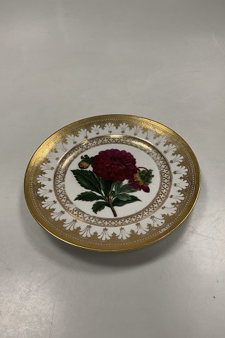 Royal Copenhagen Antique Plate with Flower Motif and gold. Signed by Christian  Klein from 1820-1850