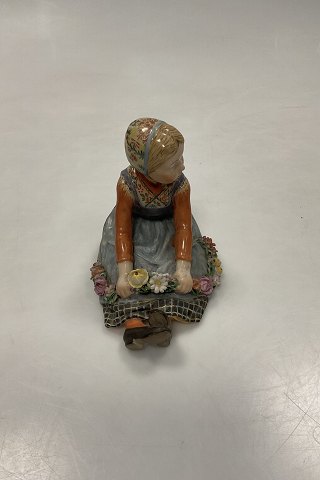 Royal Copenhagen Overglaze figurine of Flower Girl Jylland No. 12421