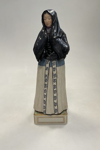 Royal Copenhagen Overglaze Figurine Woman in Church Dress, Amager No. 12107