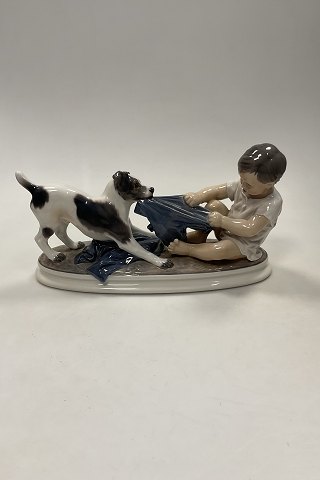 Dahl Jensen Figurine of wire haired Foxterrier dog in play with boy No 1072