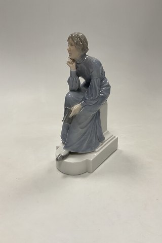 Royal Copenhagen figurine, Pensive Lady reading Designed by Christian Thomsen No 435